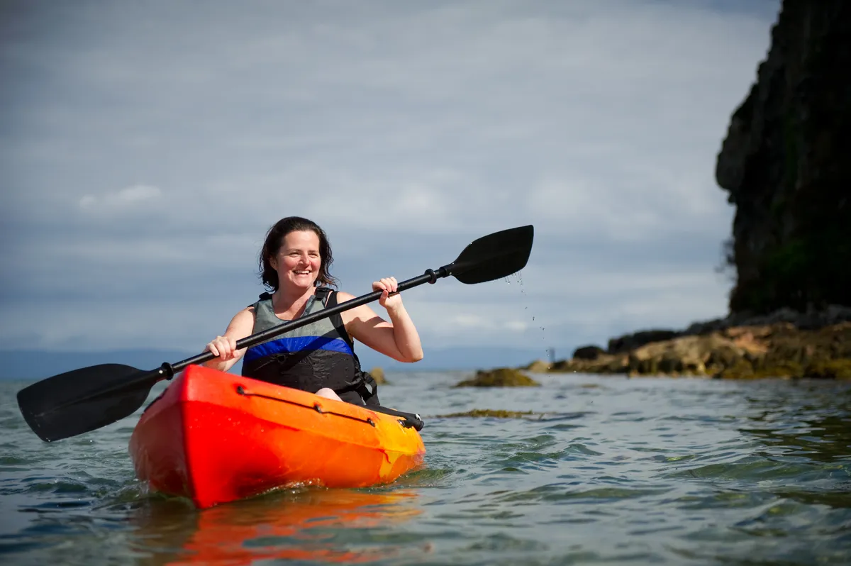 Woman kayaking in the sea/Credit: Getty Images