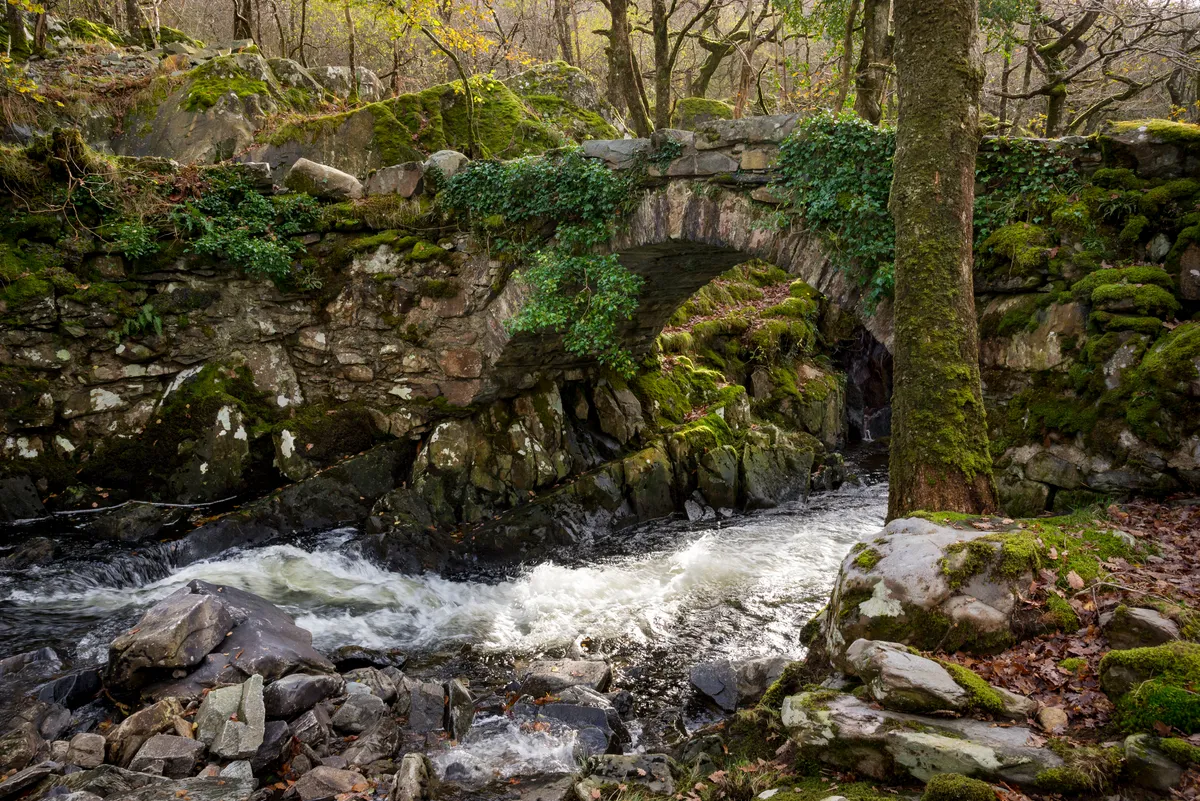 Beautiful old stone bridge in the Snowdonia national park, North Wales.
