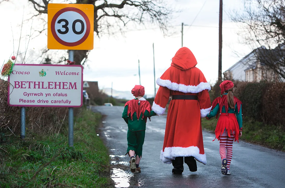 Father Christmas and his elves in Welsh village