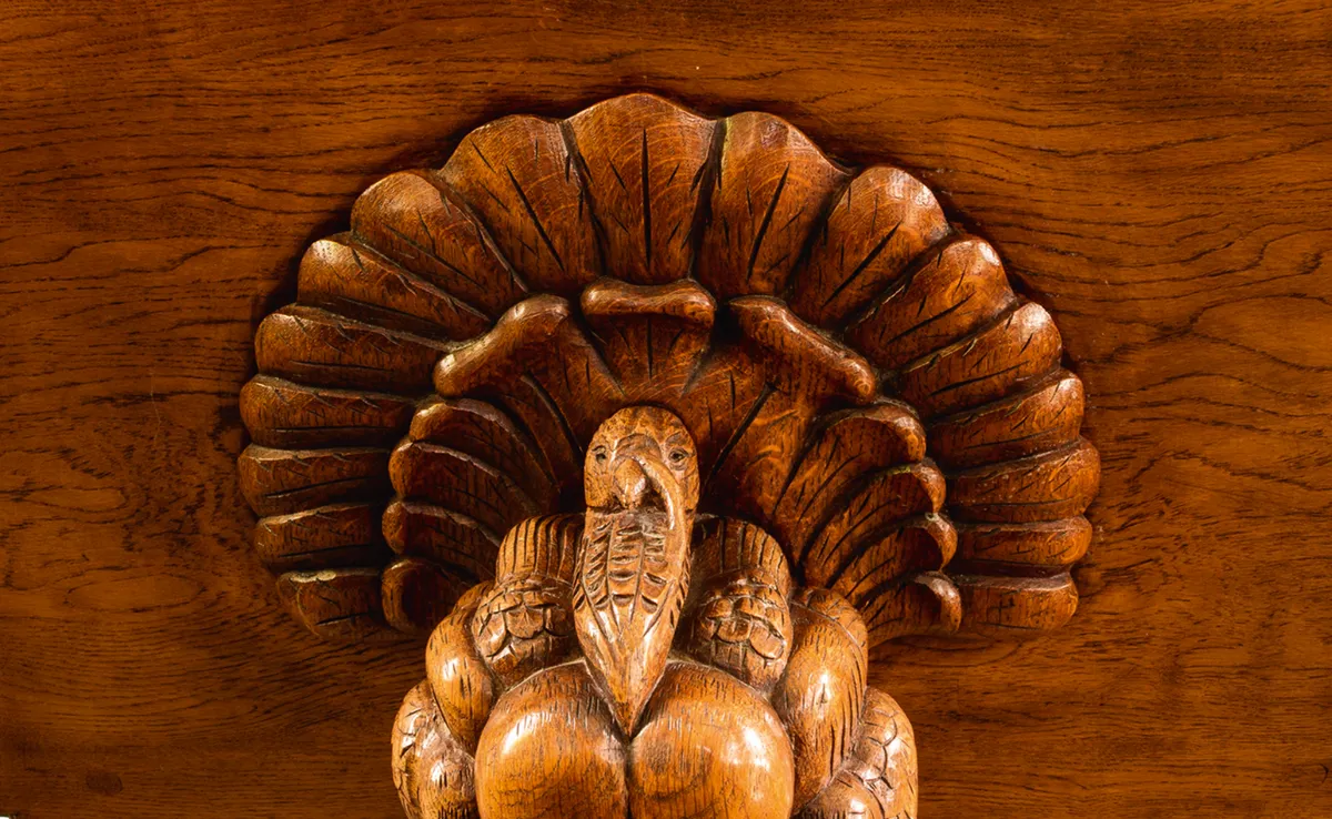 A wooden turkey supports the lectern at St Andrew’s Church in Boynton/Credit: Alamy