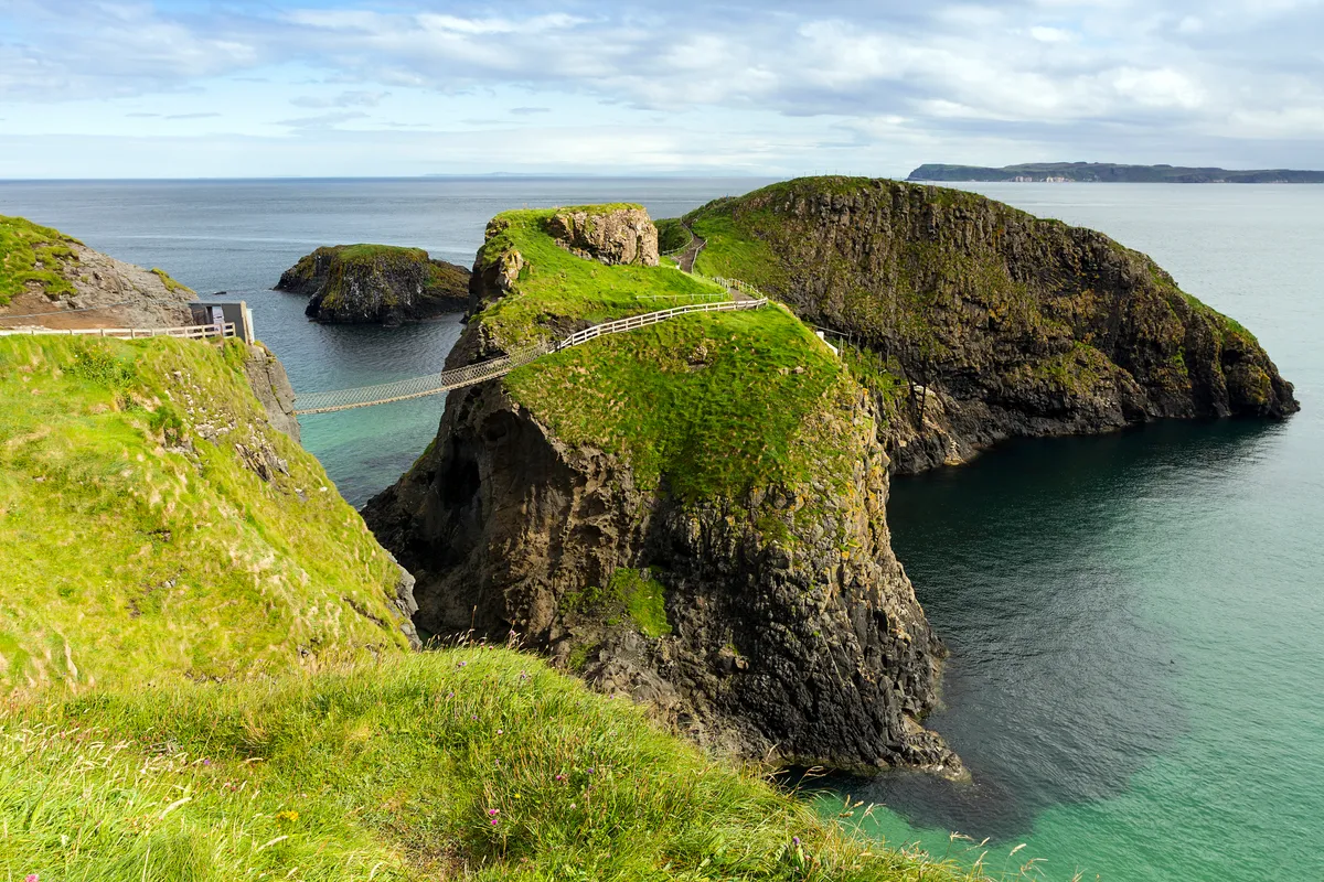 Carrick-a-Rede boasts an exhilarating rope bridge experience. Traditionally fishermen erected the bridge to Carrick-a-Rede island over a 23m-deep and 20m-wide chasm to check their salmon nets. Today visitors are drawn here simply to take the rope bridge challenge!