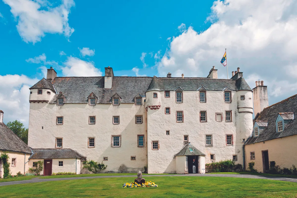 Traquair House was once visited by Mary, Queen of Scots and is home to the largest hedged maze in Scotland./Credit: Alamy