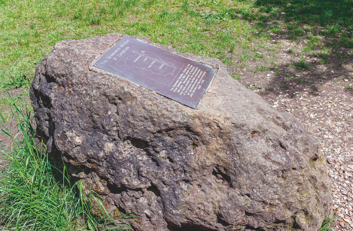 Stone and plaque on grass