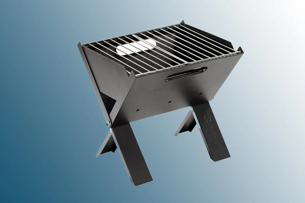 Outwell Cazal Portable BBQ Grill & Fire Pit on a blue background