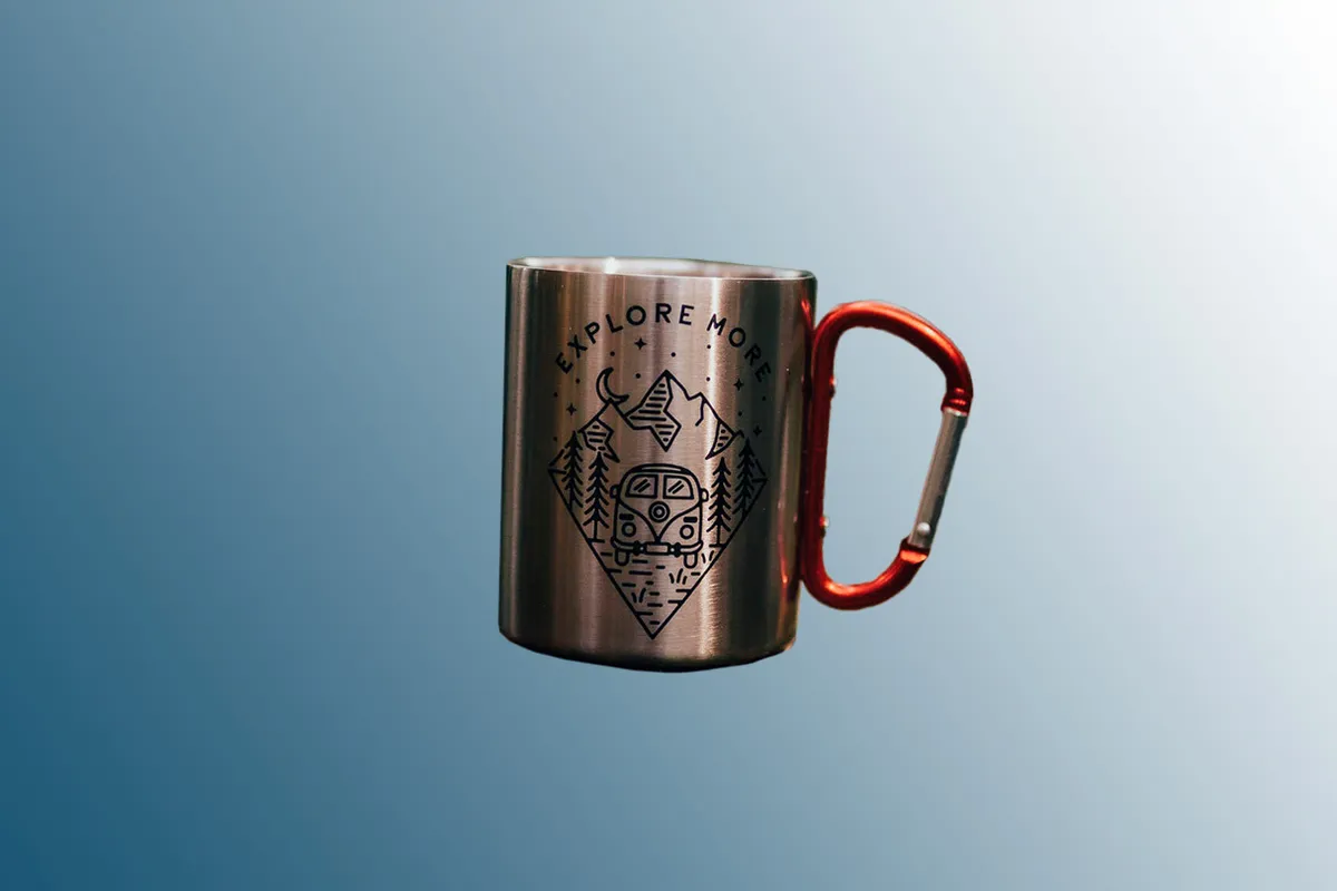 Explore More Steel Carabiner Camping Mug Coffee Cup on a blue background