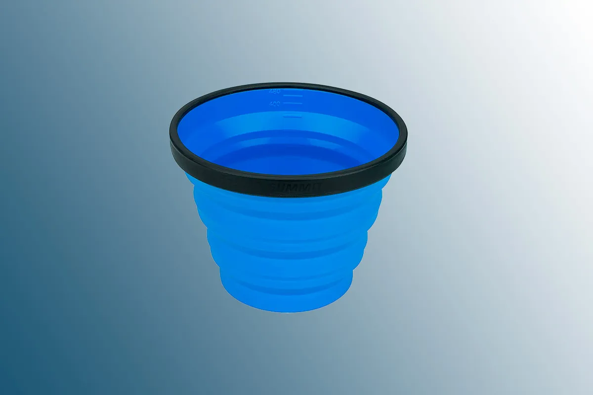 Sea to Summit X Collapsible Silicone Mug on a blue background