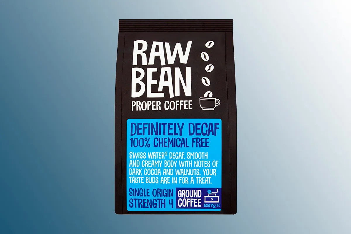 Raw Bean Definitely Decaf coffee on a blue background