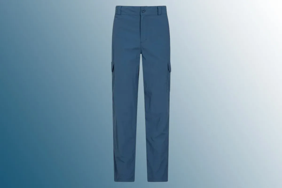 Blue walking trousers on blue background 