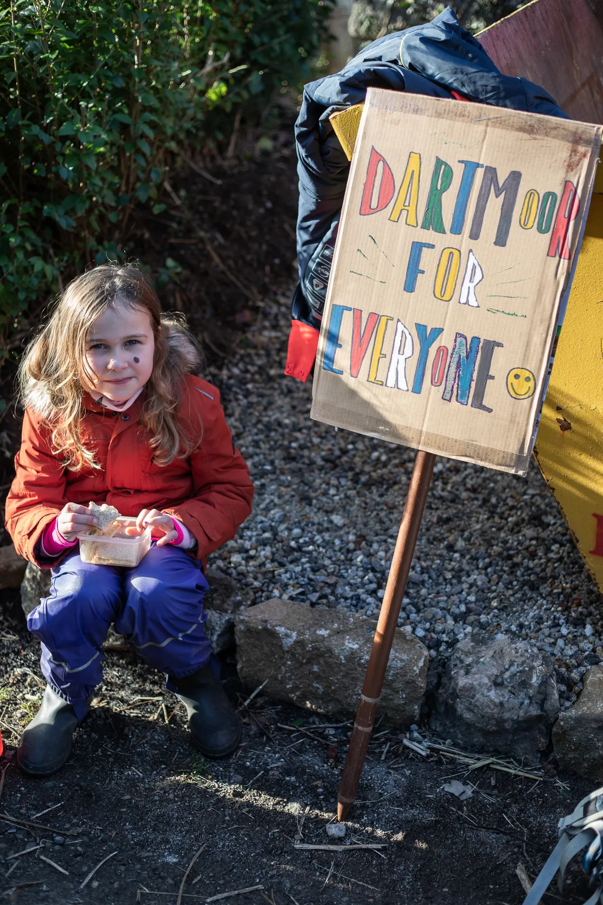 Child and 'Dartmoor is for Everyone' protest sign