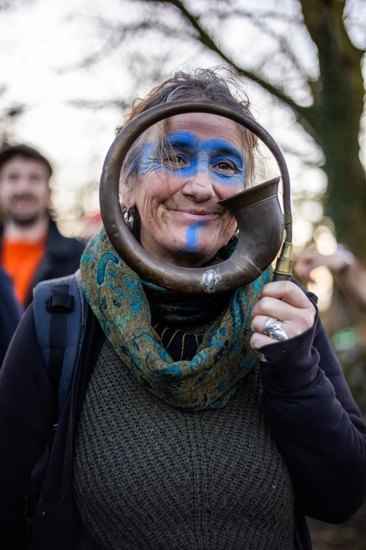 Right to Roam protestor with blue facepaint and horn