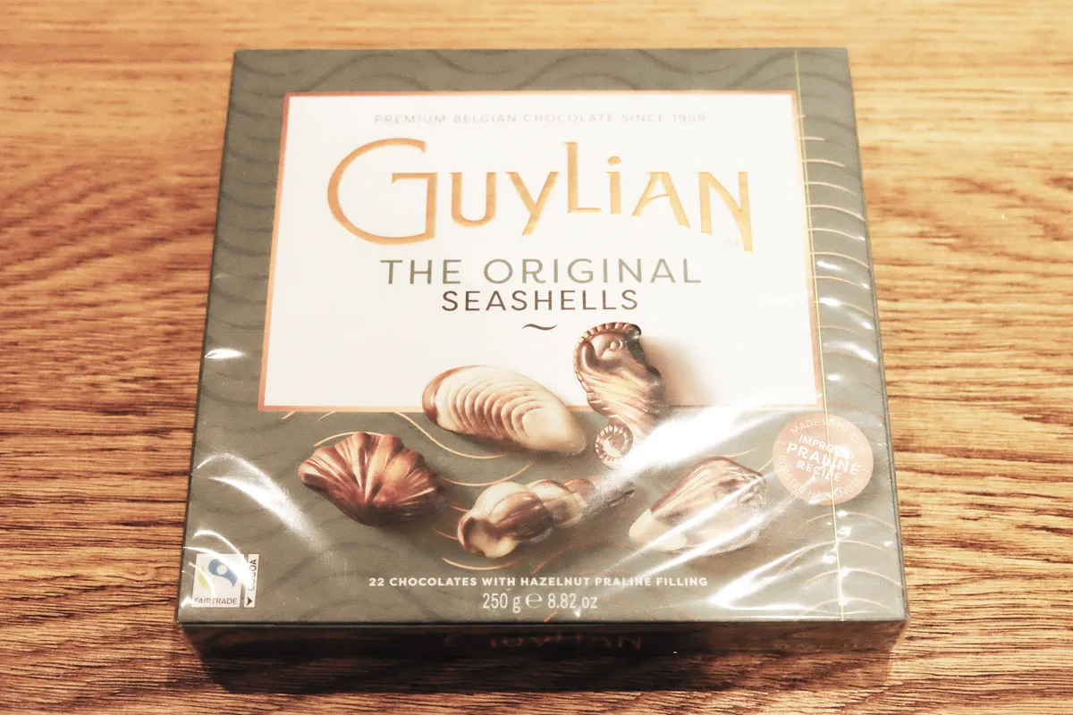 Guylian Seashells Boxed Chocolates on a wooden table