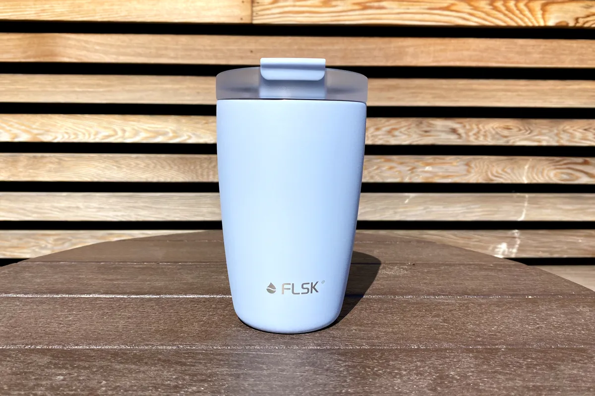 Flsk Coffee To Go Tumbler on a wooden table