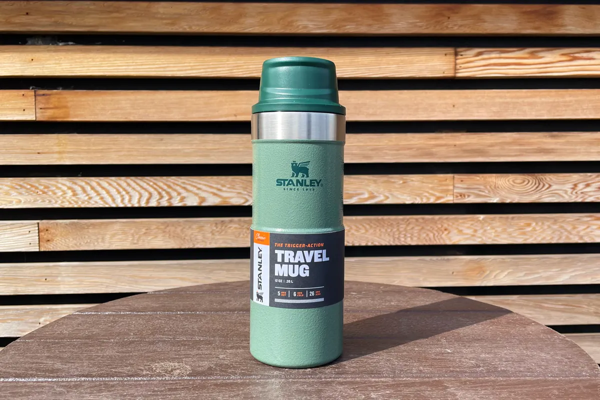 Stanley travel mug on a wooden table
