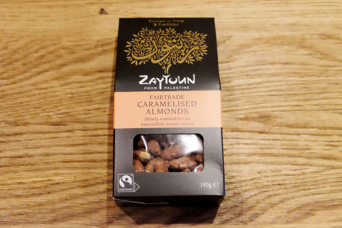 Zaytoun Caramelised Almonds on a wooden table