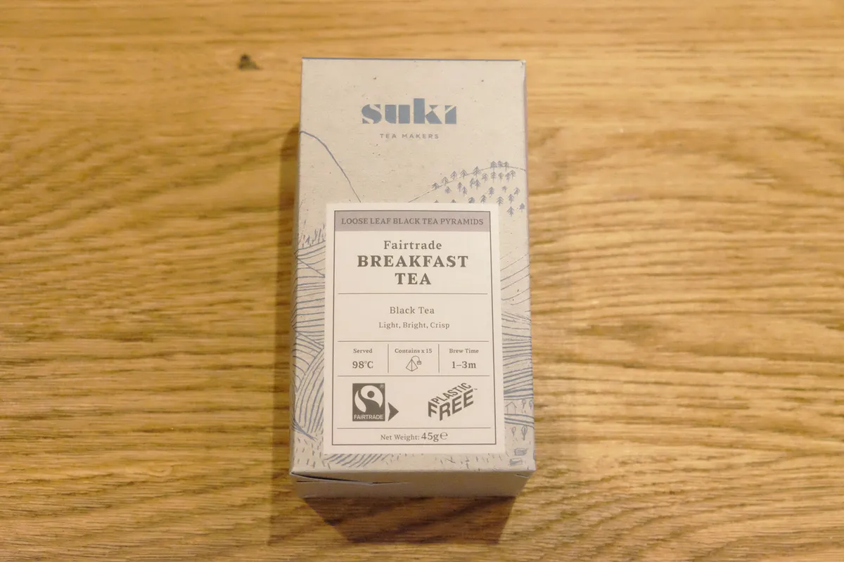 Suki English Breakfast Tea on a wooden table