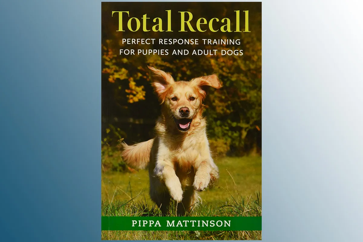 Total Recall: Perfect Response Training for Puppies and Adult Dogs on a blue background