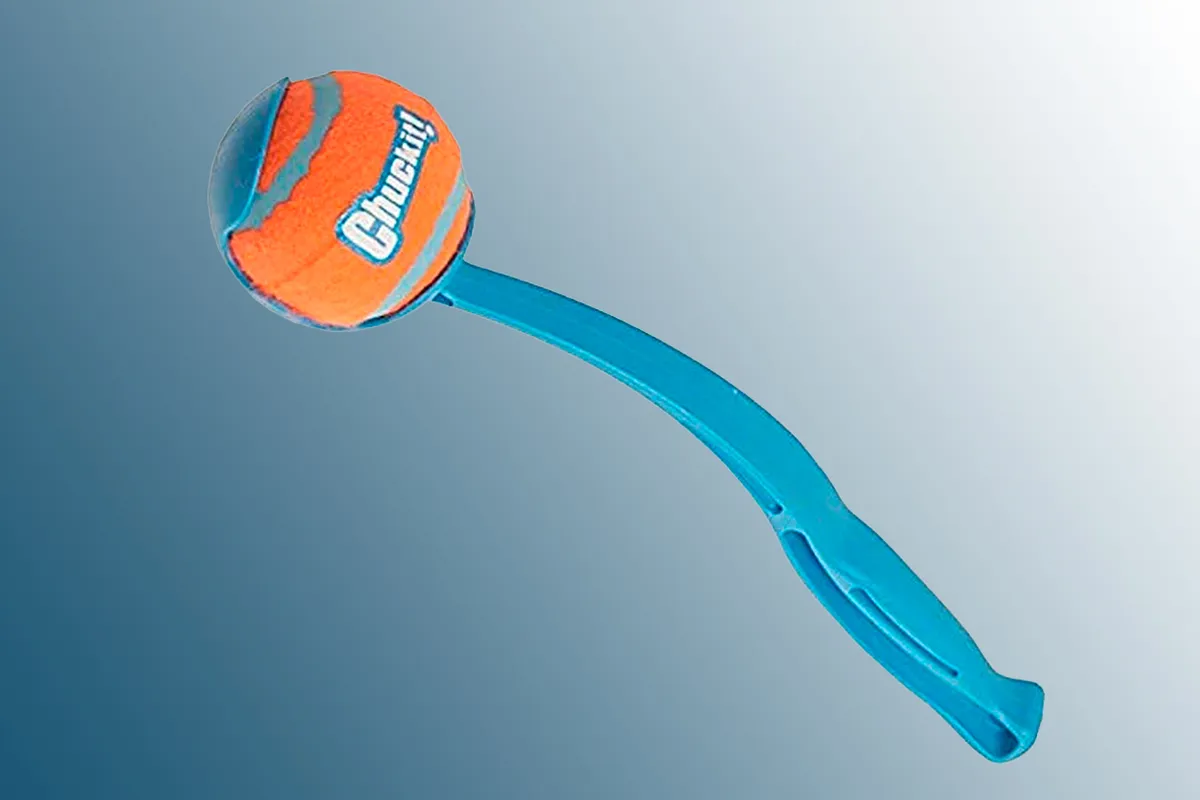 Chuckit! Sport Dog Ball Launcher on a blue background