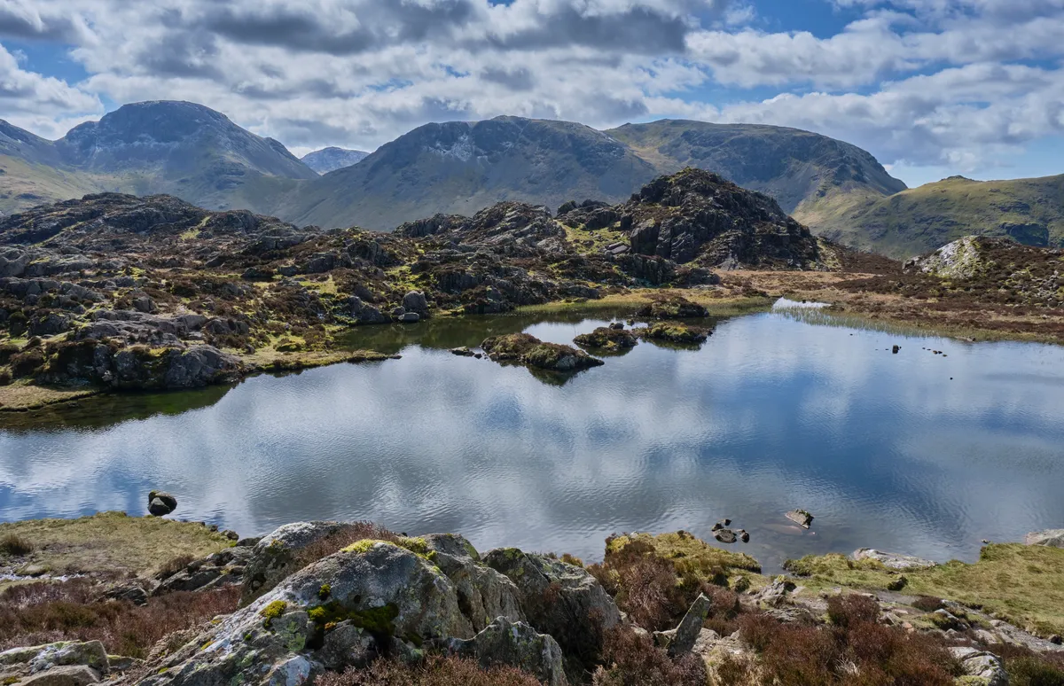 Innominate Tarn on Hay Stacks looking towards Kirk Fell and Great Gable near Buttermere