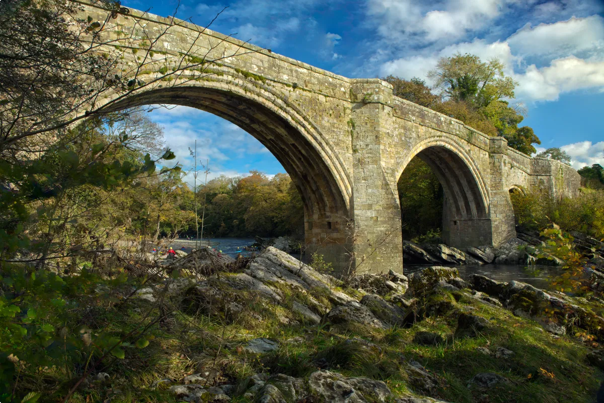 devils bridge at kirkby lonsdale with foreground and sky