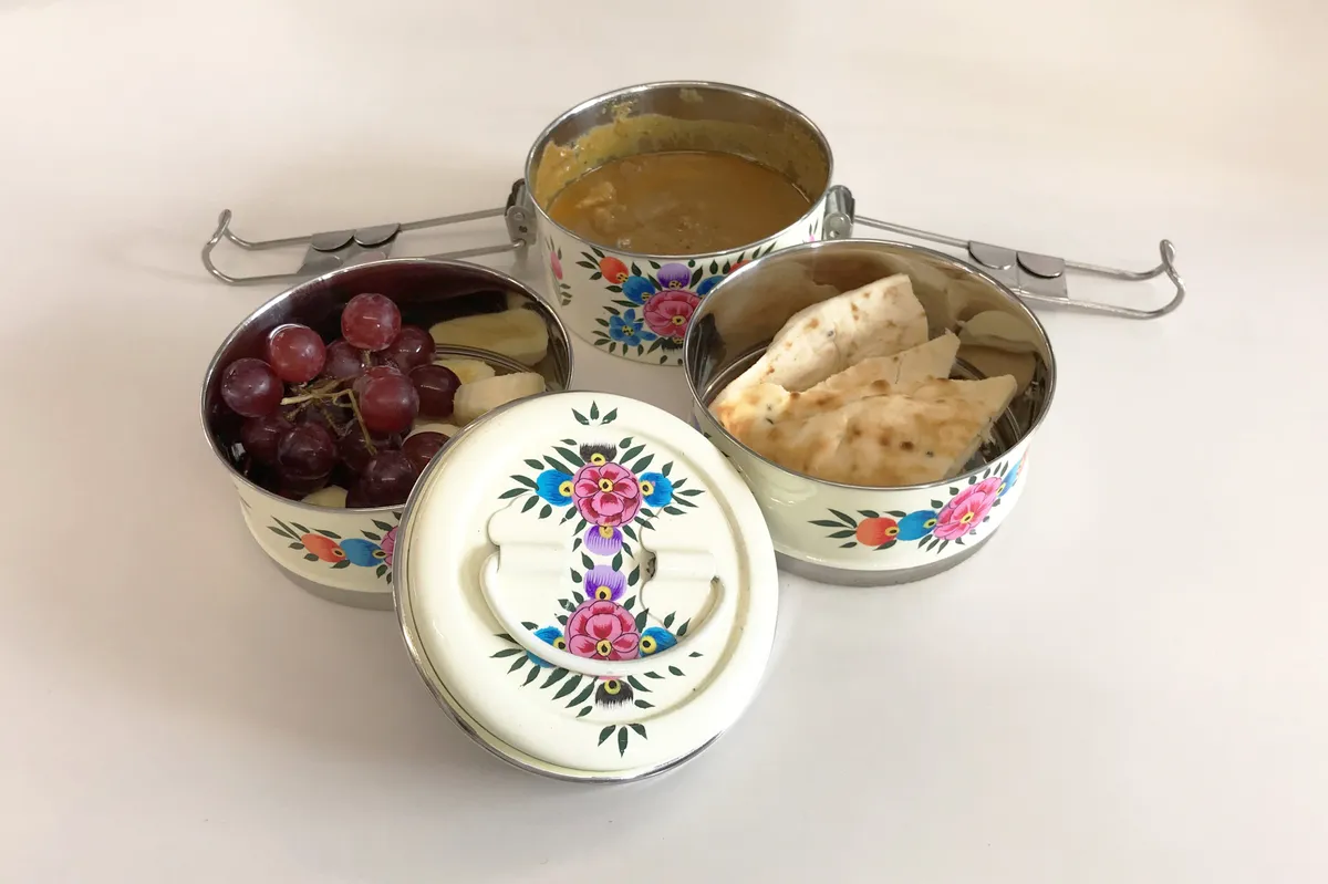 Traditional Hand Painted Indian Tiffin Box on a white background