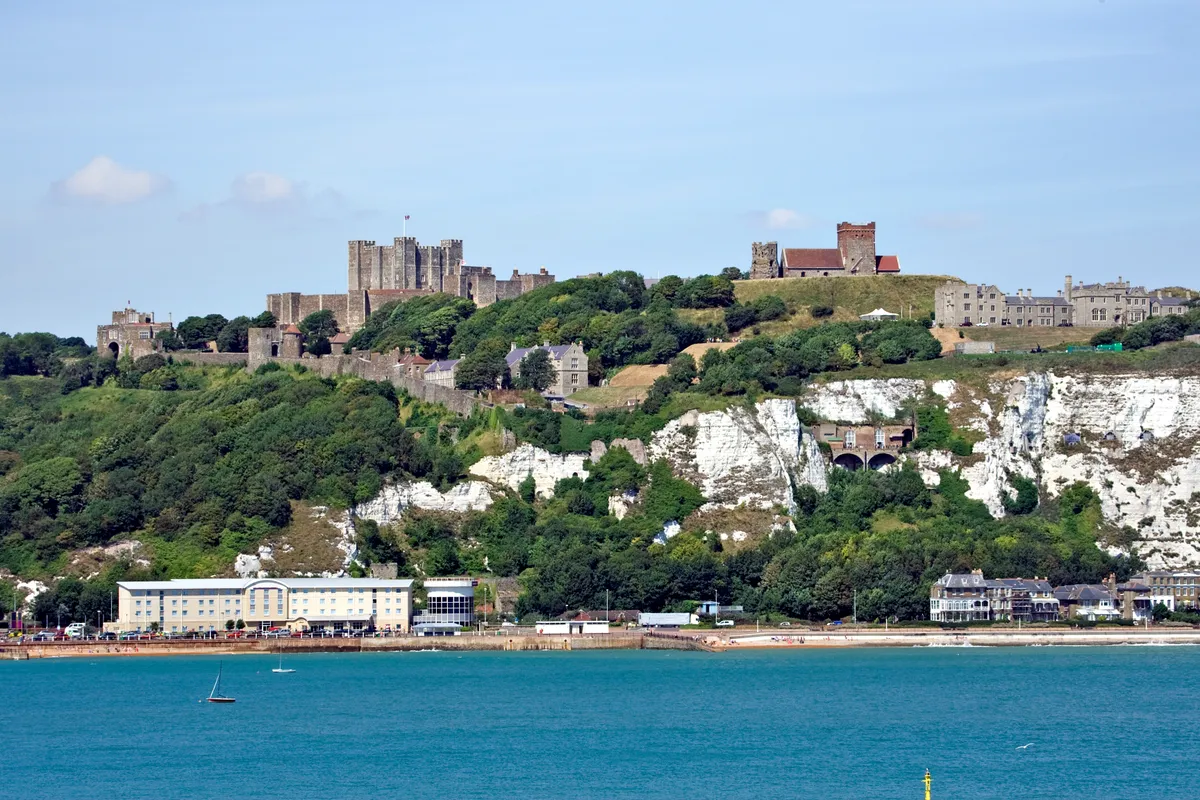 Dover Harbour and Castle with sea and blue sky