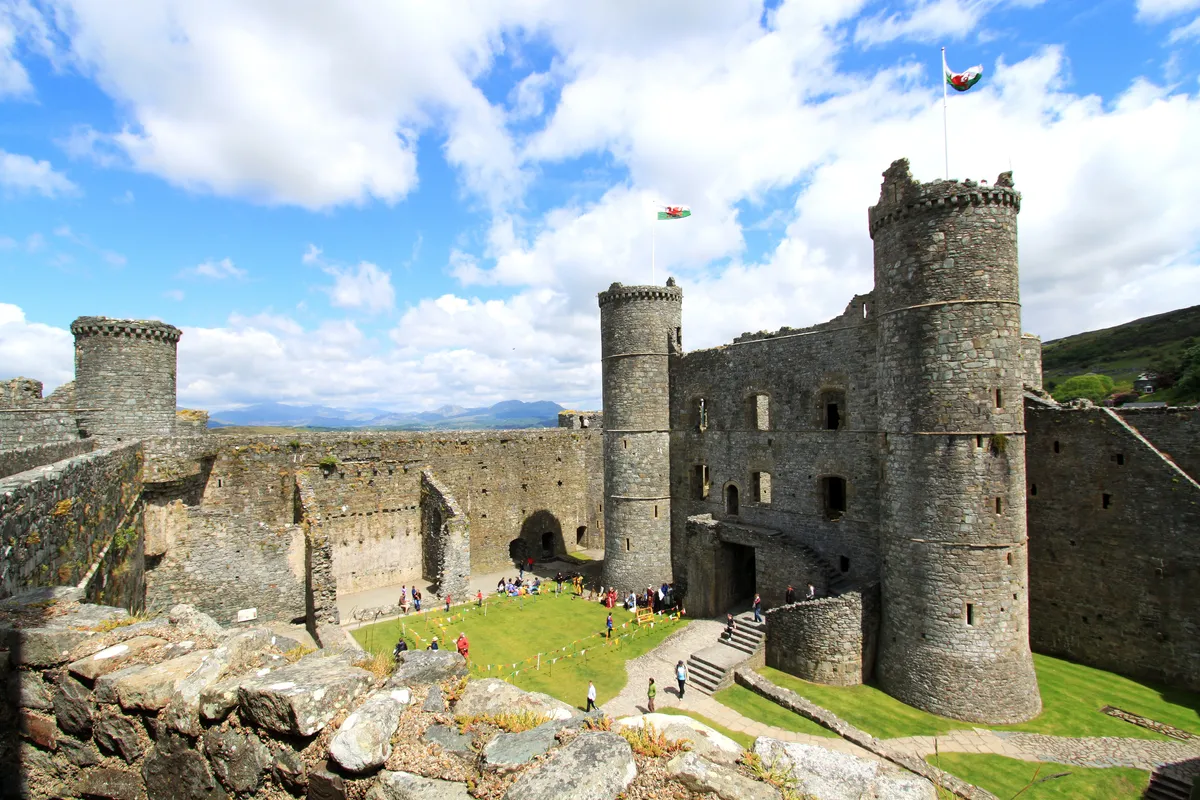 Ruins of Harlech Castle with Snowdon in background