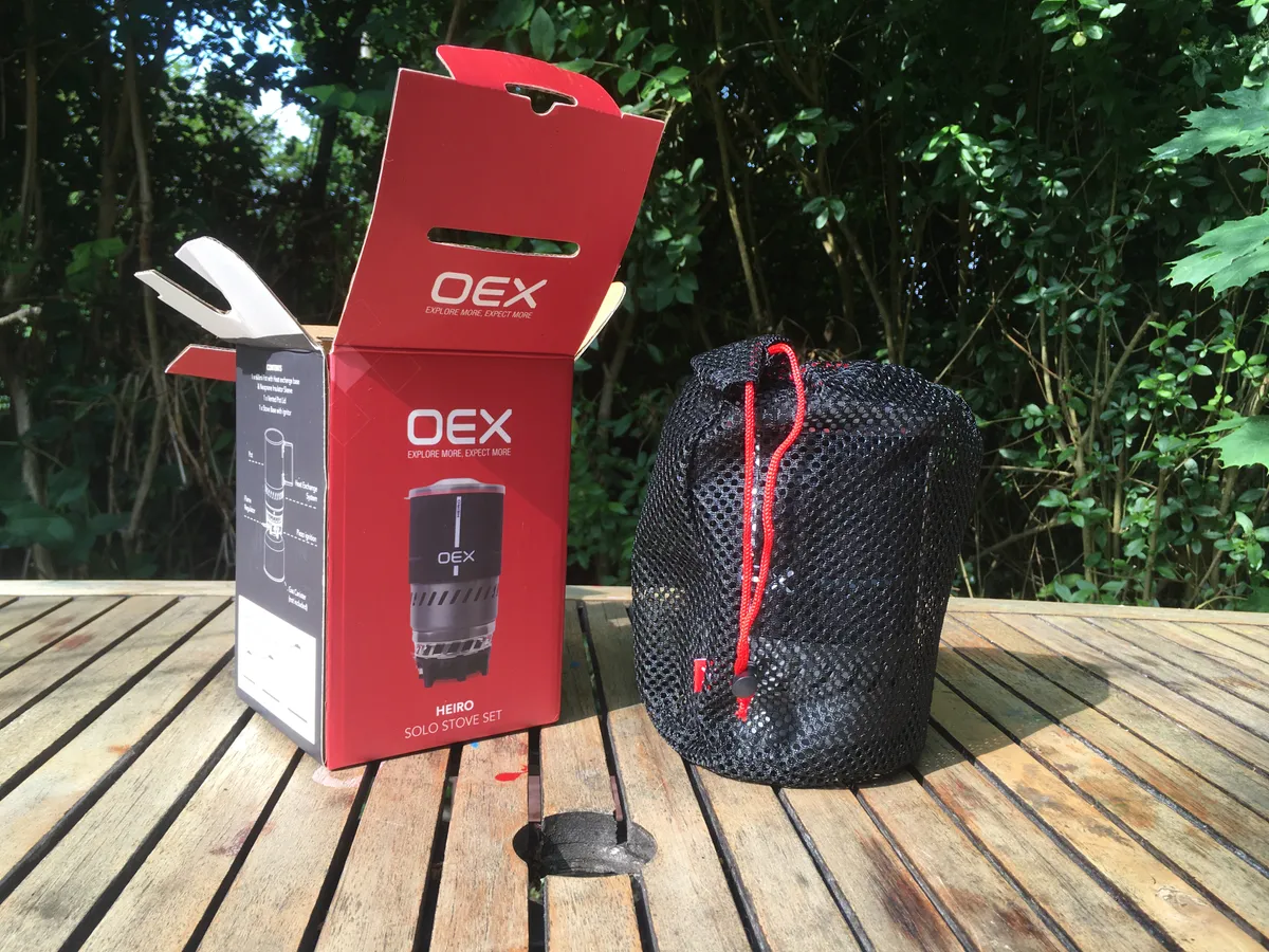 OEX Heiro camping stove on a wooden table
