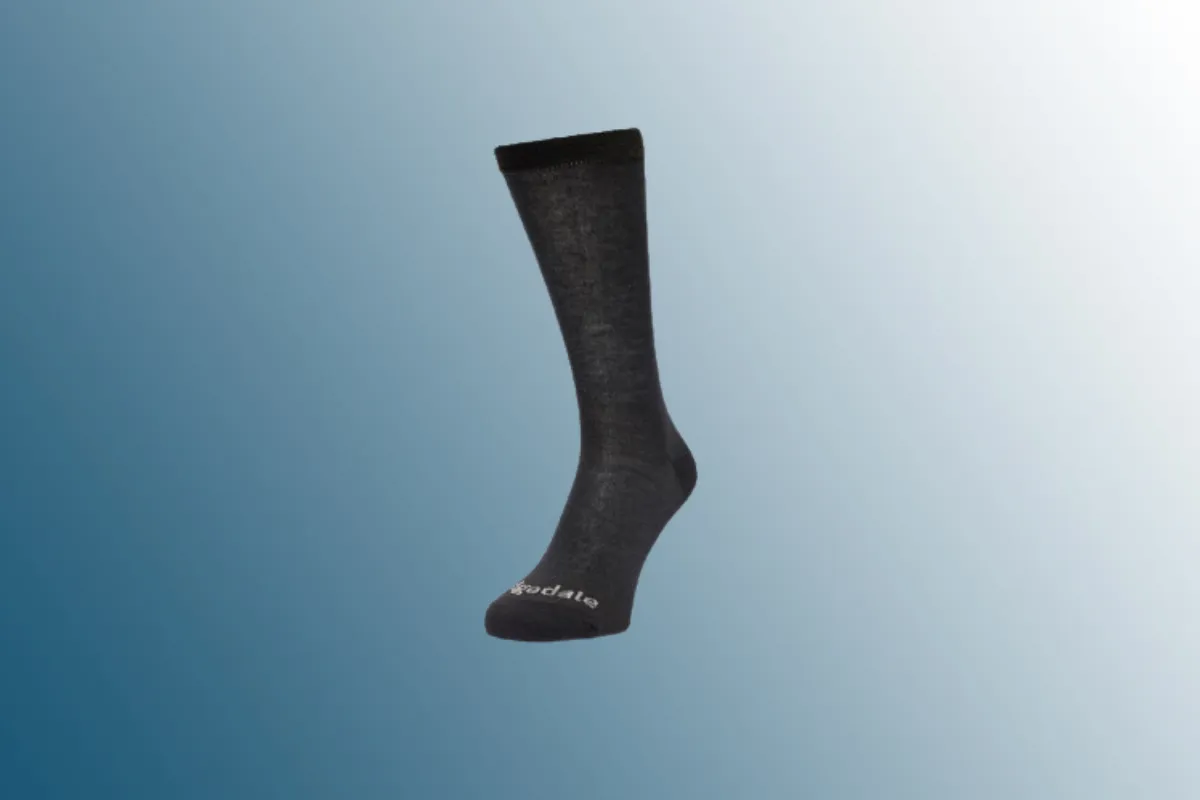 Black sock on blue background 