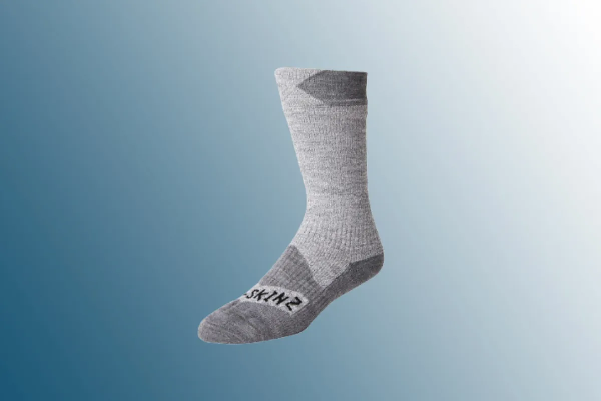Grey sock on blue background 