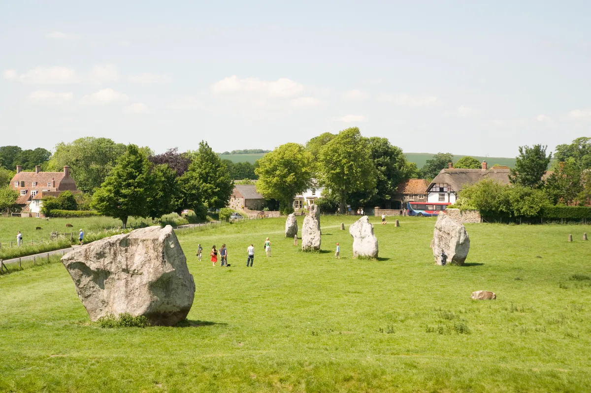 Tourists at Avebury Stone Circles in summer