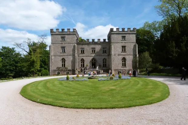 Clearwell Castle with blue sky and clouds