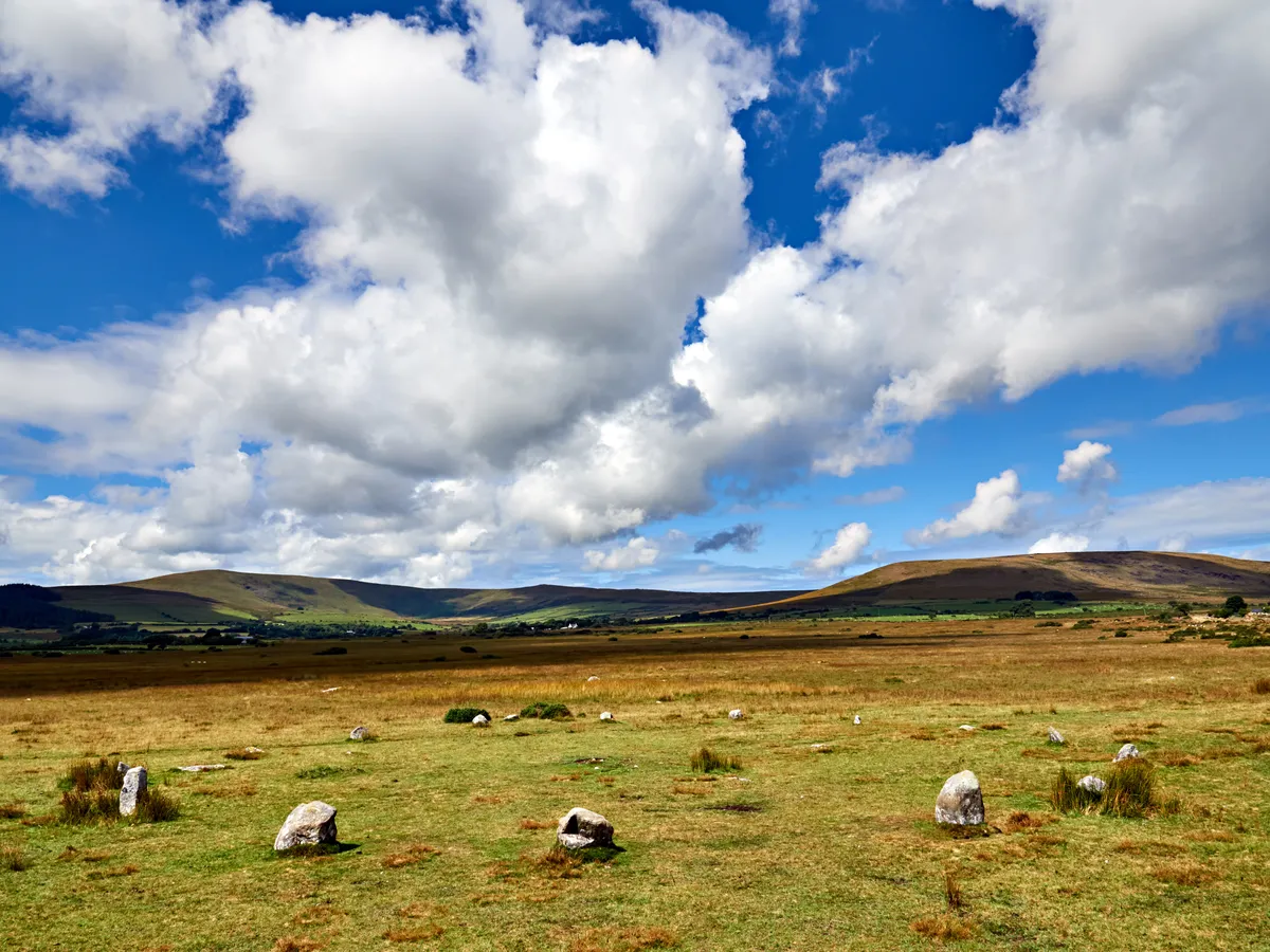 Gors Fawr Stone Circle in the Preseli Hills with blue sky and clouds