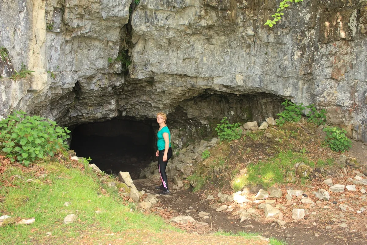 Walking standing next to Yordas Cave