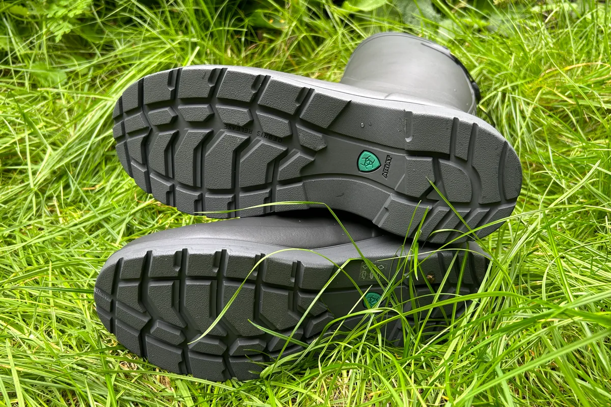 Soles of Ariat wellies on grass