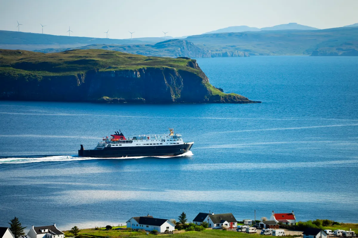 Isle of Skye ferry on a sunny day with cliffs