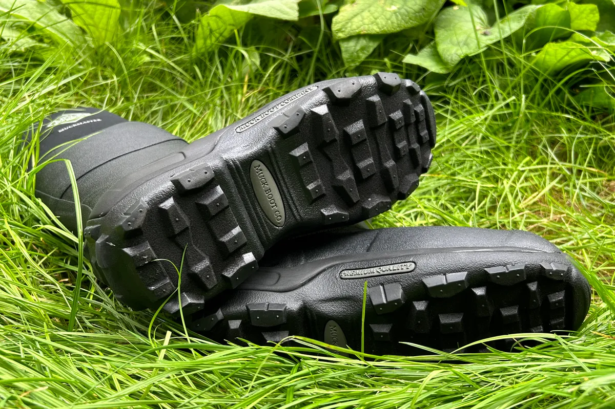 Muck boots soles on grass