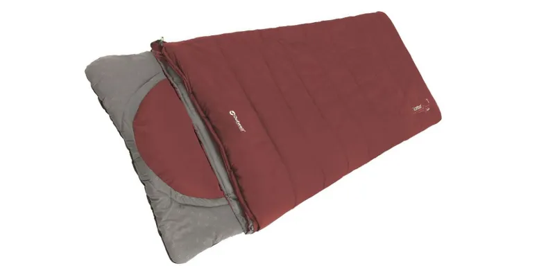 Red sleeping bag on white background 