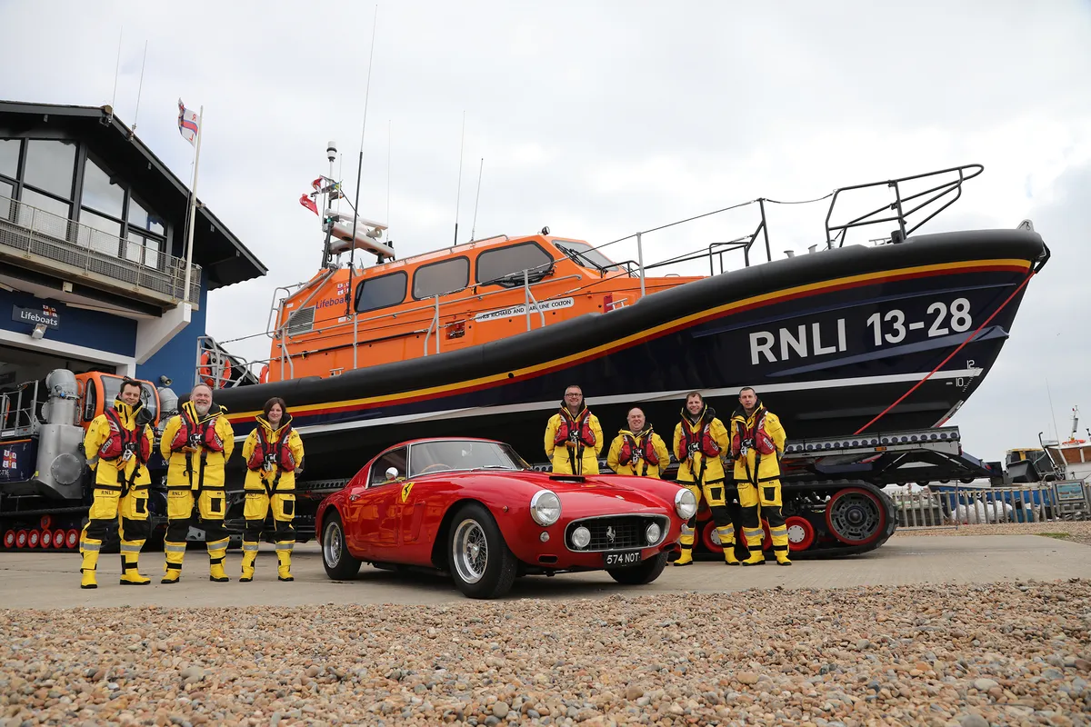 Hastings crew with their new Shannon Class lifeboat funded by the legacy of Richard Colton through the sale of his collection of classic Ferrari cars