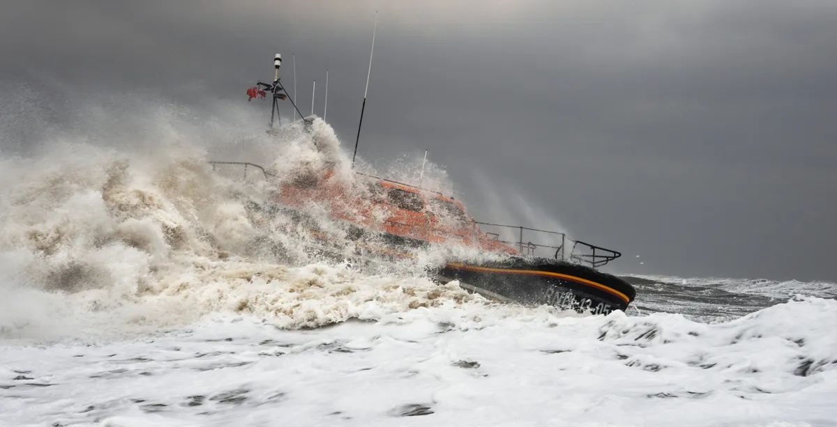 RNLI lifeboat at sea in storm