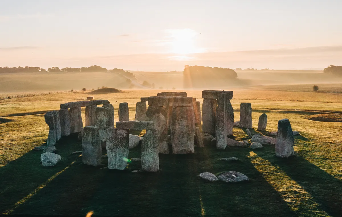 An aerial view of Stonehenge at sunrise