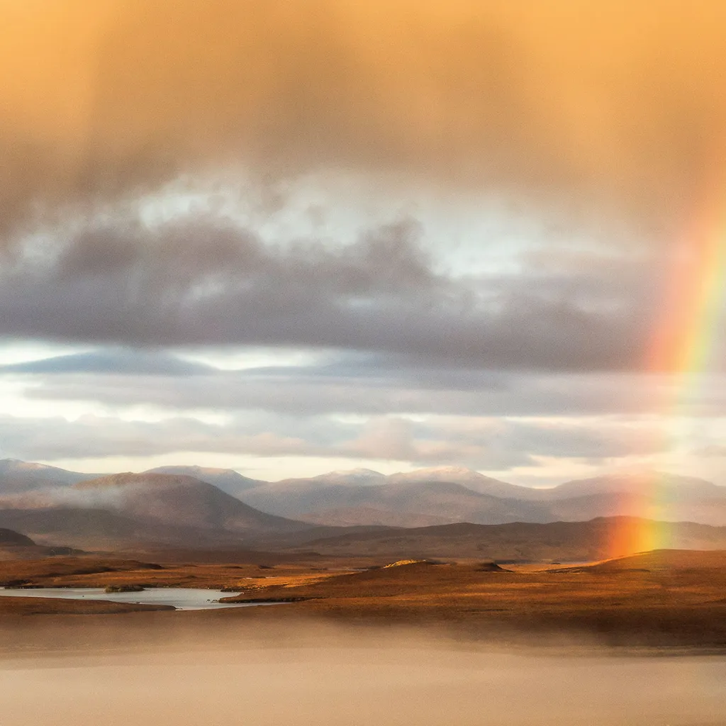 A rainbow appears over islands in the Outer Hebrides
