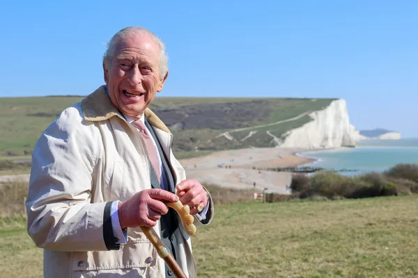 Royal seal of approval: The King surprises walkers on the 6.5 million ...