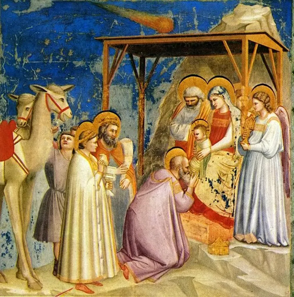 Adoration of the Magi by Florentine painter Giotto di Bondone. The Christmas star of Bethlehem appears like as a blazing comet.