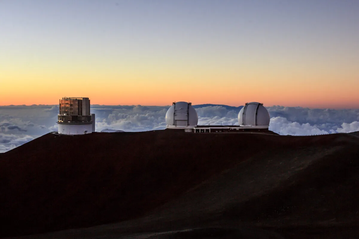 The Subaru, Keck I and Keck II Telescopes at the Mauna Kea Observatories at Sunset on the Big Island of Hawaii