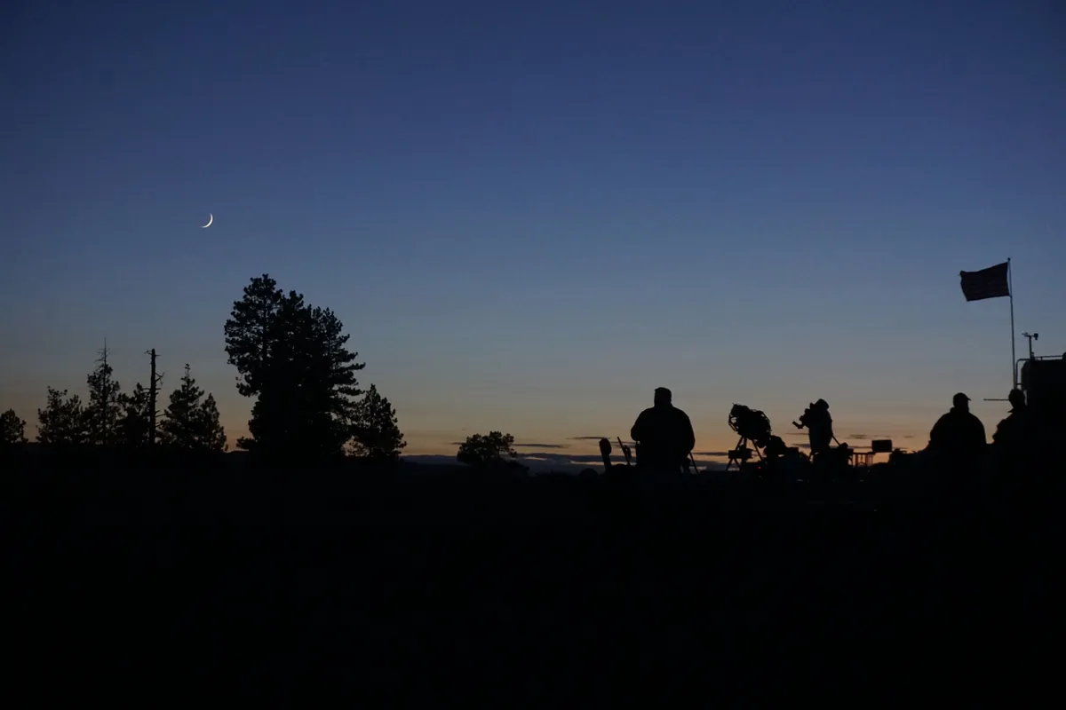 Amateur Astronomers getting ready for a night of observing at the Oregon Star Pary. Credit: WestWindGraphics / Getty Images
