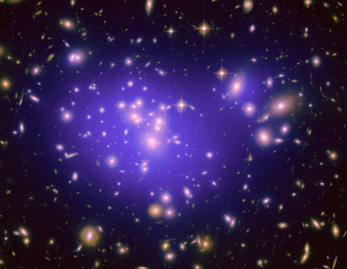 A dark matter halo mapped in galaxy Abell 1689. Credit: NASA, ESA, E. Jullo (Jet Propulsion Laboratory), P. Natarajan (Yale University), and J.-P. Kneib (Laboratoire d'Astrophysique de Marseille, CNRS, France); Acknowledgment: H. Ford and N. Benetiz (Johns Hopkins University), and T. Broadhurst (Tel Aviv University)