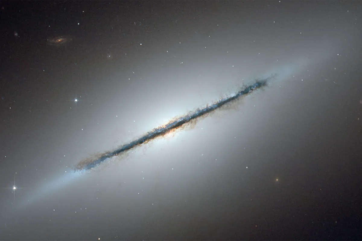 Lenticular galaxy NGC 5866. Credit: NASA, ESA, and The Hubble Heritage Team (STScI/AURA); Acknowledgment: W. Keel (University of Alabama, Tuscaloosa)