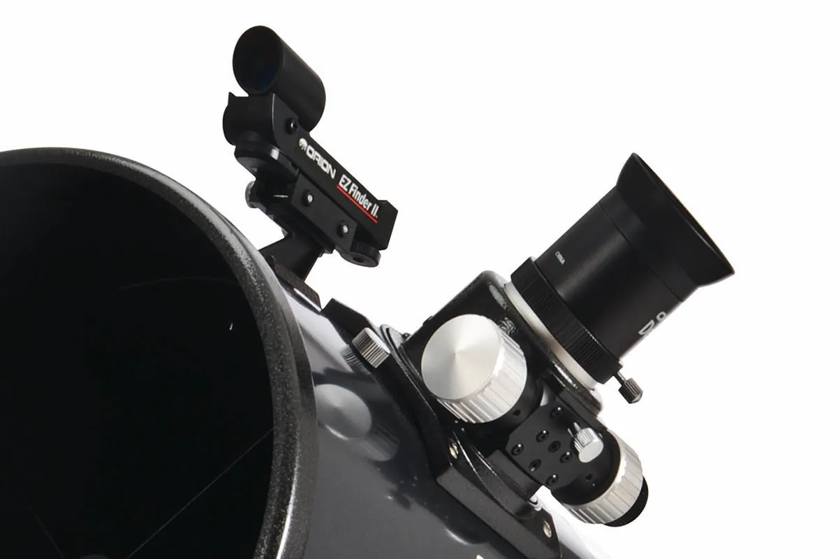 An eyepiece sits in a telescope’s focuser, held there tightly by a little screw.