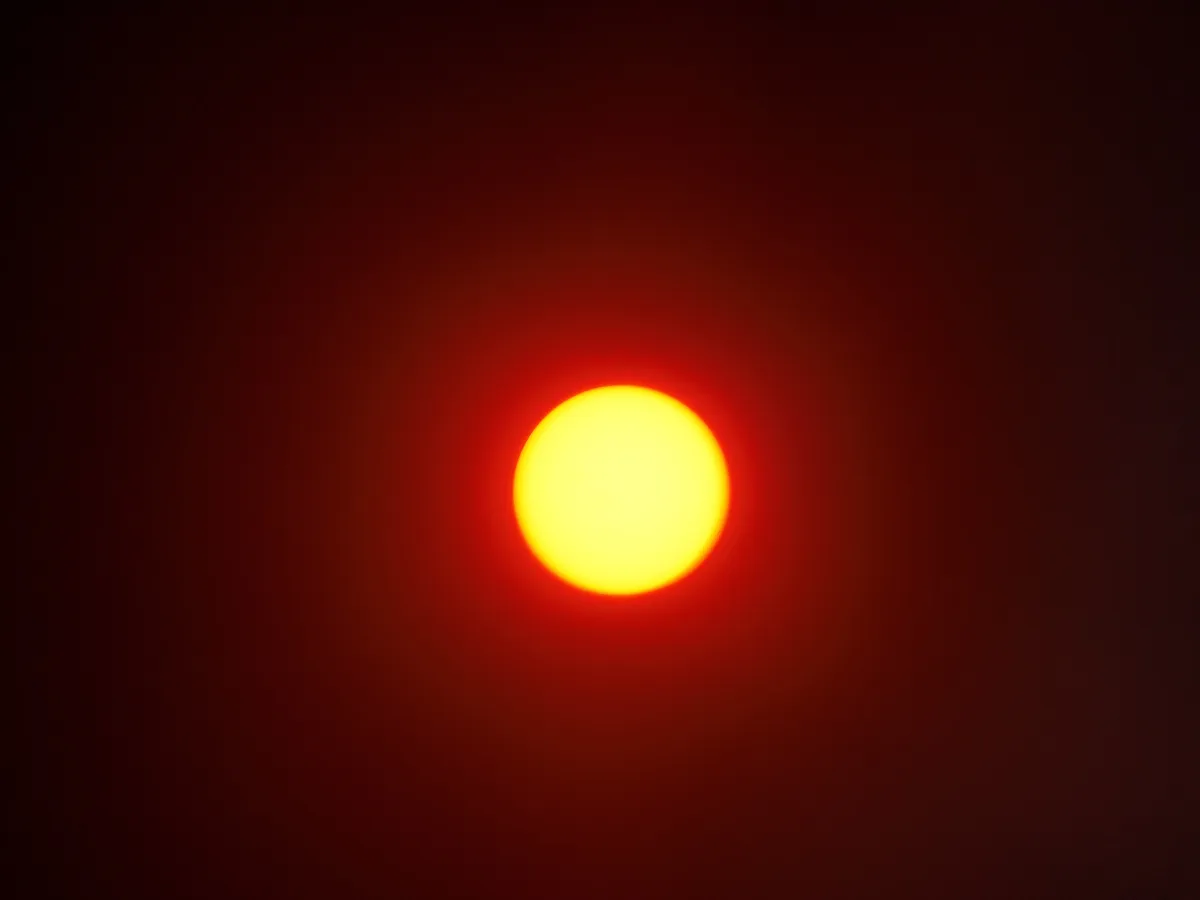 The Sun by Andrew Mackenzie, Wigan, UK. Equipment: GE x2600 camera, Celestron Powerseeker 76AZ Telescope, Red telescope filter, homemade solar filter.