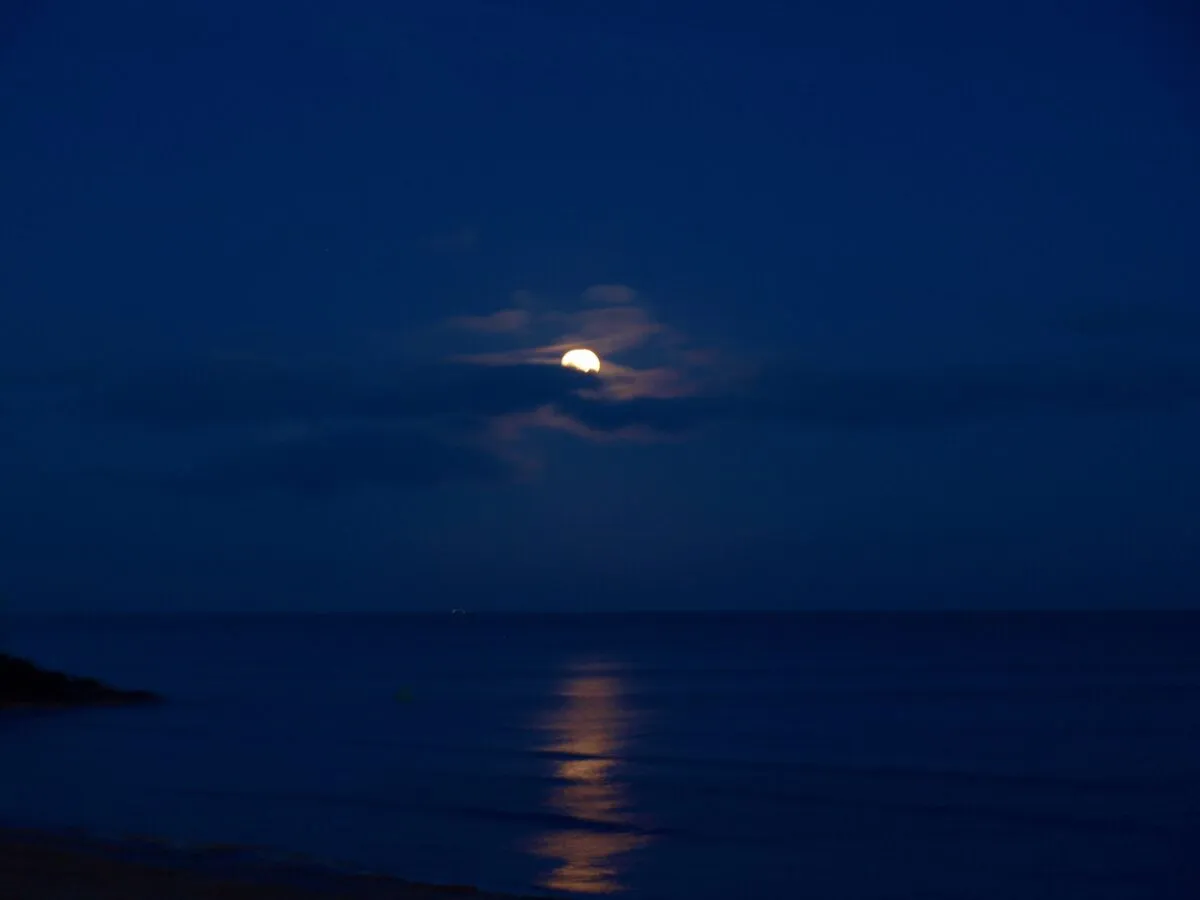 Supermoon, engulfed by clouds in Clacton-On-Sea by Shantelle Robinson, Clacton-On-Sea, UK. Equipment: Olympus E-420